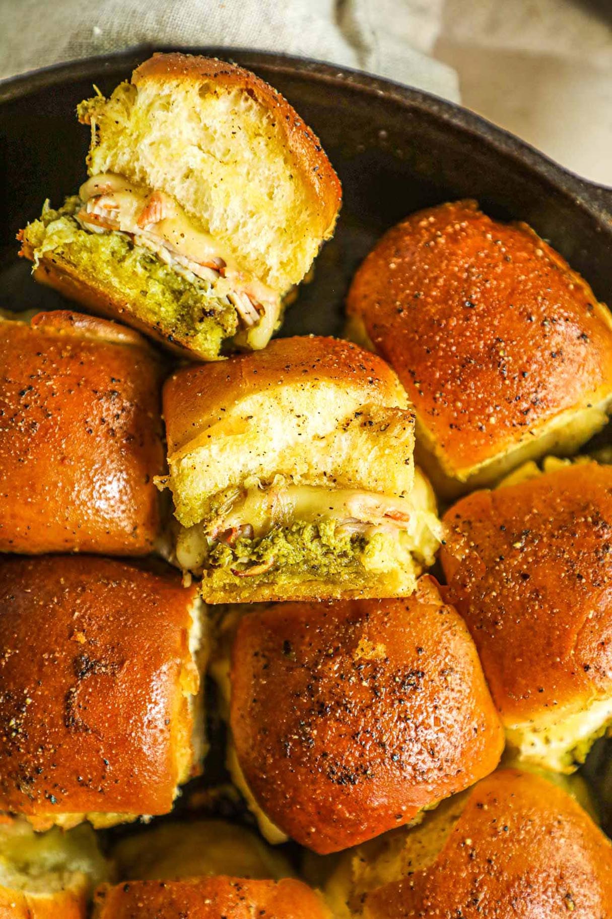 Pesto Swiss And Turkey Skillet Sliders